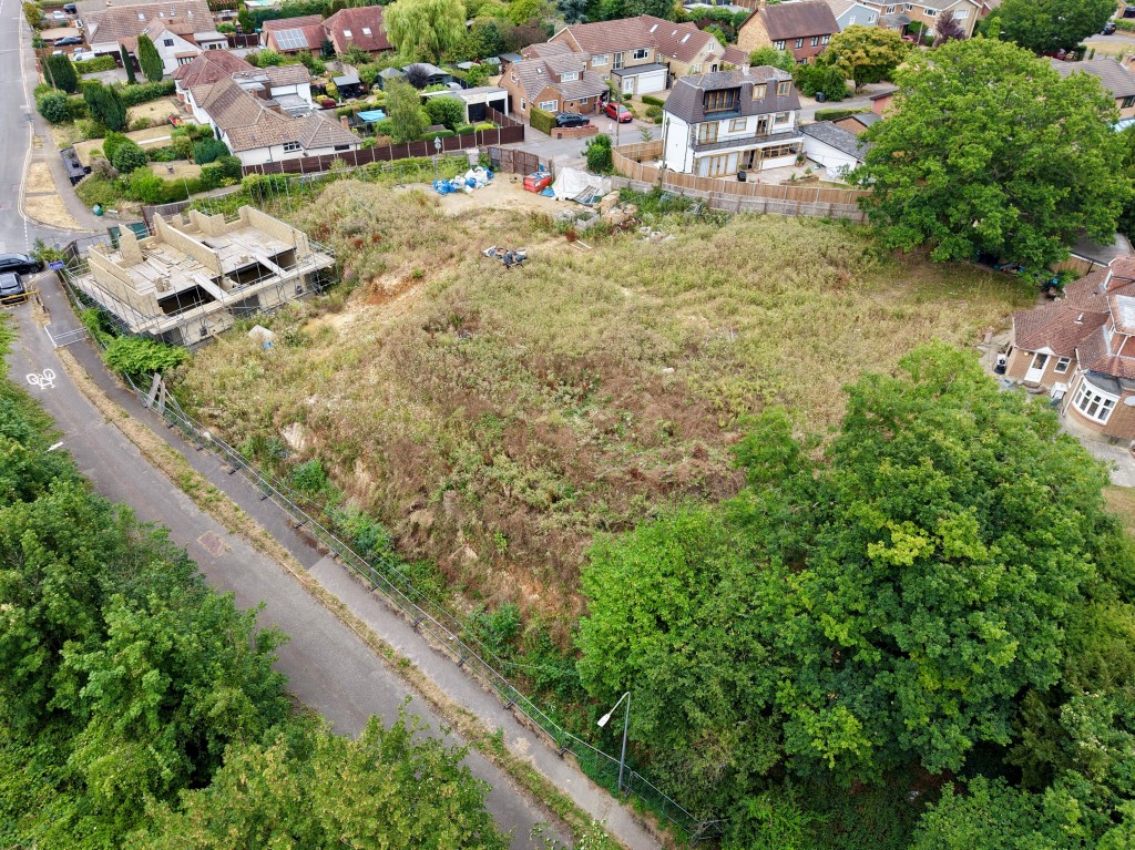 Lot: 47028 - VALUABLE RESIDENTIAL SITE FOR SEVEN NEW HOMES - Aerial view looking north east